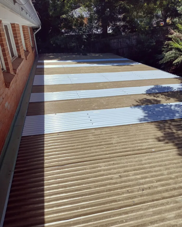Verandah roof after cleaning, clear of leaves and twigs
